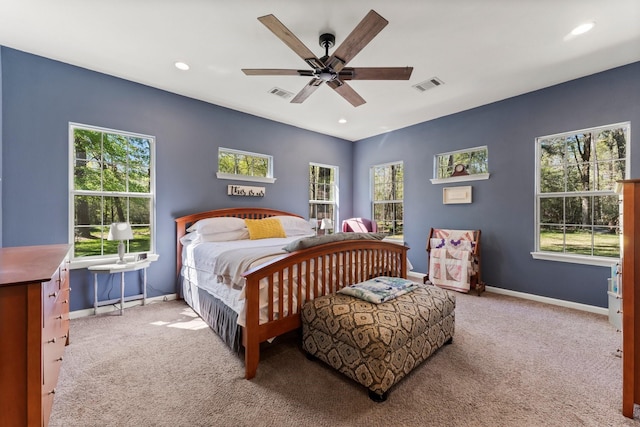3027 Pine Acres Dr, Conroe, TX 77384 - bedroom featuring carpet flooring, baseboards, multiple windows, and recessed lighting