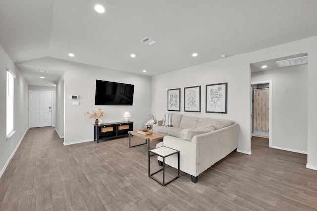 13916 Great Pines Ct, Conroe, TX 77302 - living room featuring baseboards, wood finished floors, recessed lighting, and lofted ceiling