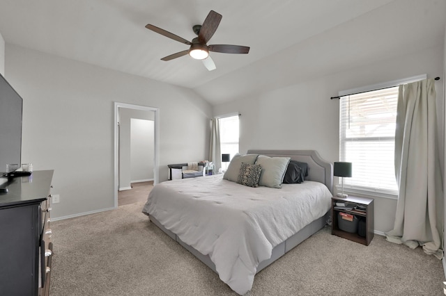 13916 Great Pines Ct, Conroe, TX 77302 - bedroom featuring light carpet, lofted ceiling, baseboards, and ceiling fan