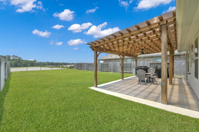 13916 Great Pines Ct, Conroe, TX 77302 - view of yard featuring a pergola and a patio area