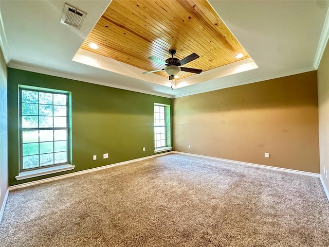 304 Ashwood Bnd, Hudson, TX 75904 - carpeted empty room with a tray ceiling, wooden ceiling, crown molding, a ceiling fan, and baseboards