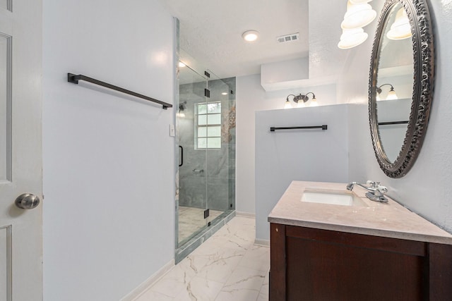 6307 Bayonne Dr, Spring, TX 77389 - bathroom with marble finish flooring, vanity, a shower stall, and baseboards