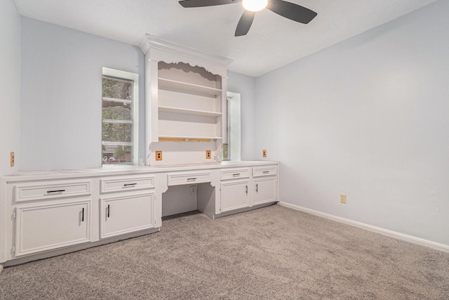 6307 Bayonne Dr, Spring, TX 77389 - unfurnished office with ceiling fan, built in study area, light carpet, and baseboards