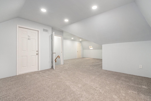6307 Bayonne Dr, Spring, TX 77389 - additional living space featuring vaulted ceiling, carpet, and recessed lighting