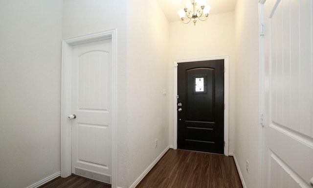 20202 Creekdale Bend Dr, Cypress, TX 77433 - foyer with a chandelier, dark wood-type flooring, and baseboards