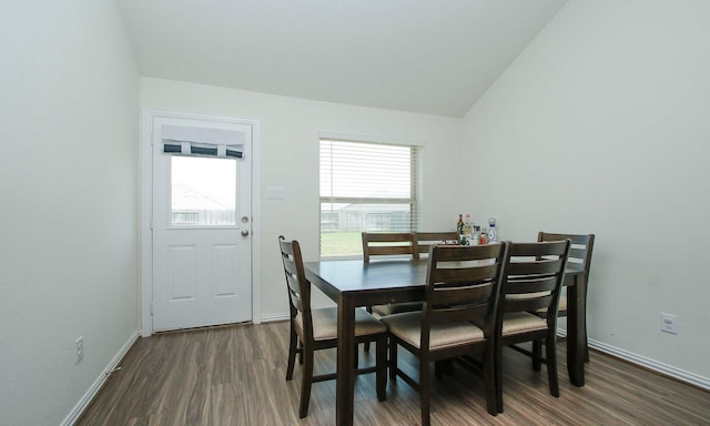20202 Creekdale Bend Dr, Cypress, TX 77433 - dining space with dark wood-style floors, vaulted ceiling, and baseboards