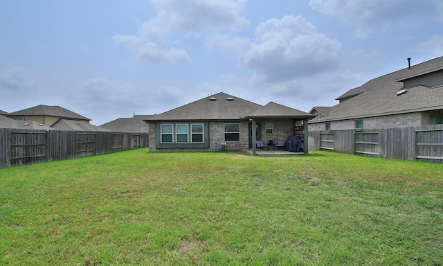 20202 Creekdale Bend Dr, Cypress, TX 77433 - rear view of property with a patio and brick siding