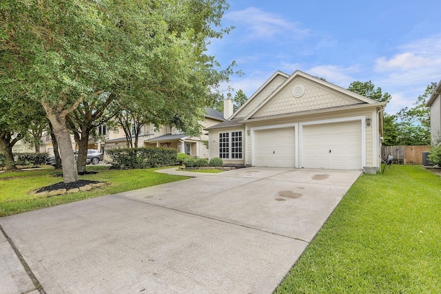 17206 Kobuk Valley Cir, Humble, TX 77346 - view of front of property featuring driveway and an attached garage