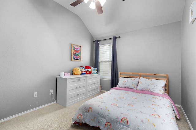 17206 Kobuk Valley Cir, Humble, TX 77346 - bedroom with lofted ceiling, light colored carpet, a ceiling fan, and baseboards