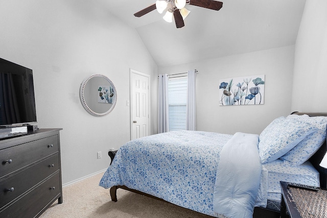 17206 Kobuk Valley Cir, Humble, TX 77346 - carpeted bedroom featuring lofted ceiling, ceiling fan, and baseboards
