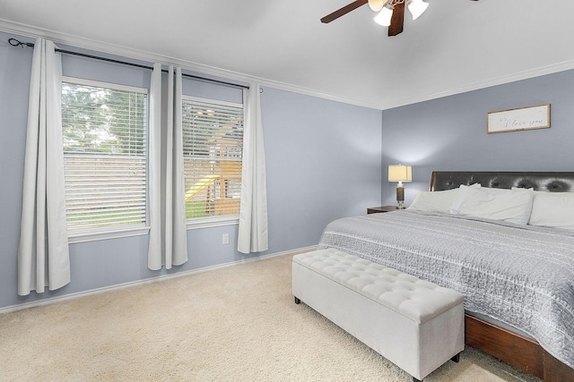 17206 Kobuk Valley Cir, Humble, TX 77346 - bedroom with carpet floors, baseboards, crown molding, and a ceiling fan