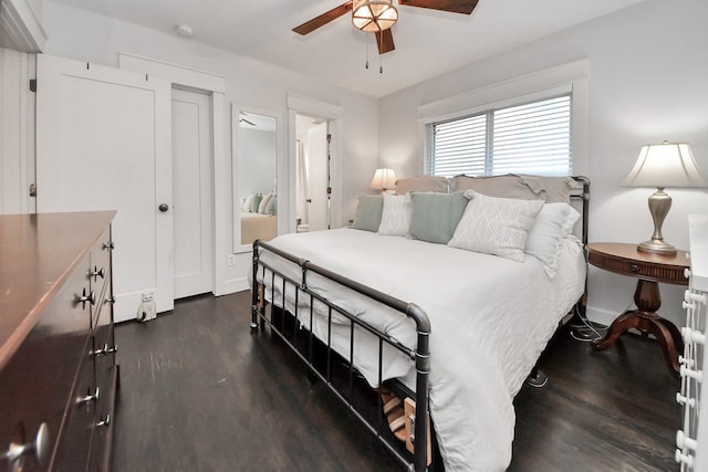 1038 Lawrence St, Houston, TX 77008 - bedroom with dark wood-style flooring and a ceiling fan