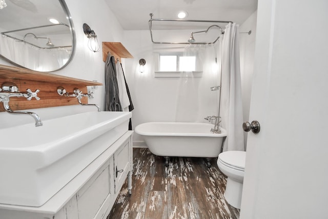 1038 Lawrence St, Houston, TX 77008 - full bath with vanity and wood finished floors