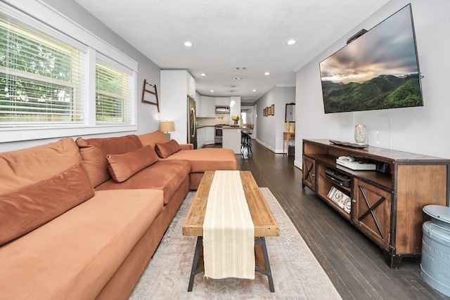 1038 Lawrence St, Houston, TX 77008 - living room with dark wood-style flooring, recessed lighting, and crown molding