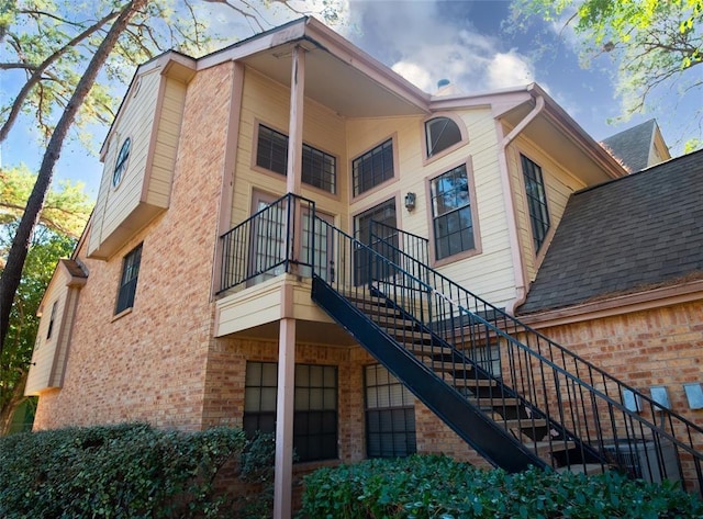 16800 Sugar Pine Dr Unit F44, Houston, TX 77090 - view of building exterior with stairway