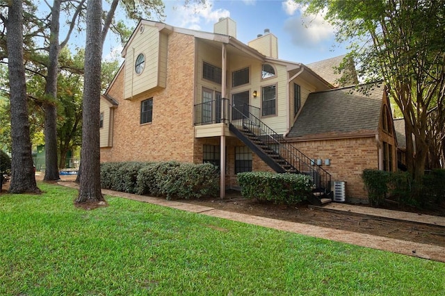 16800 Sugar Pine Dr Unit F44, Houston, TX 77090 - view of property featuring stairs and central AC unit