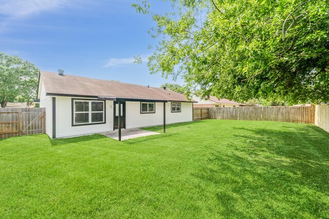 11114 Daybreak Ln, Cypress, TX 77429 - rear view of house featuring a patio and a shingled roof
