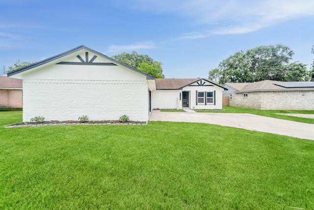 11114 Daybreak Ln, Cypress, TX 77429 - view of front of house featuring a front lawn, brick siding, and driveway