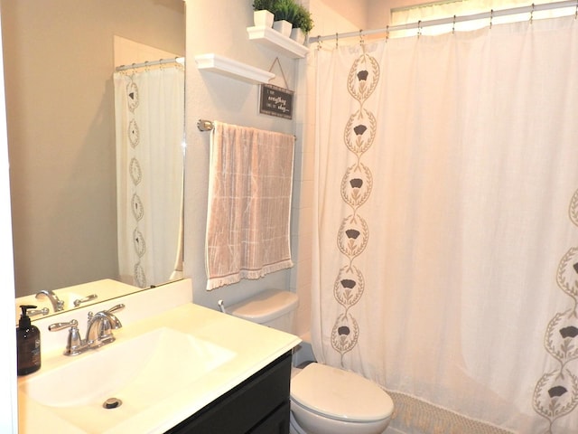 2705 Osprey Ln, Pearland, TX 77581 - full bathroom with toilet, vanity, and curtained shower