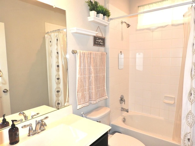 2705 Osprey Ln, Pearland, TX 77581 - full bathroom with vanity, toilet, and shower / bath combo