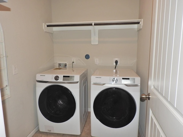 2705 Osprey Ln, Pearland, TX 77581 - washroom with washing machine and clothes dryer