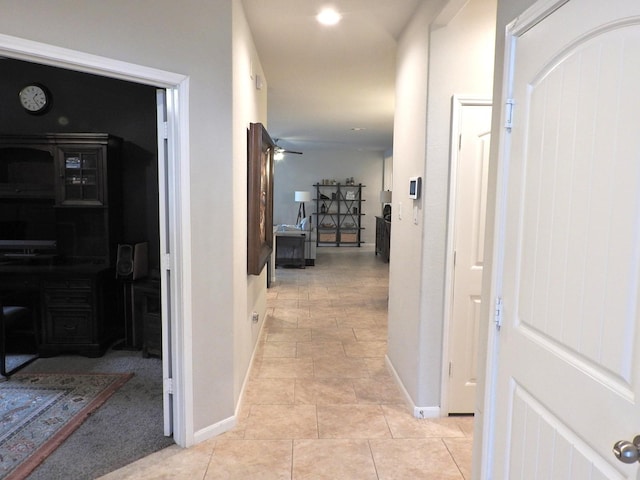 2705 Osprey Ln, Pearland, TX 77581 - hall with baseboards and light tile patterned flooring