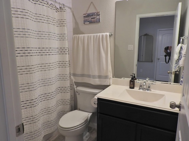 2705 Osprey Ln, Pearland, TX 77581 - full bathroom featuring toilet, vanity, and a shower with shower curtain