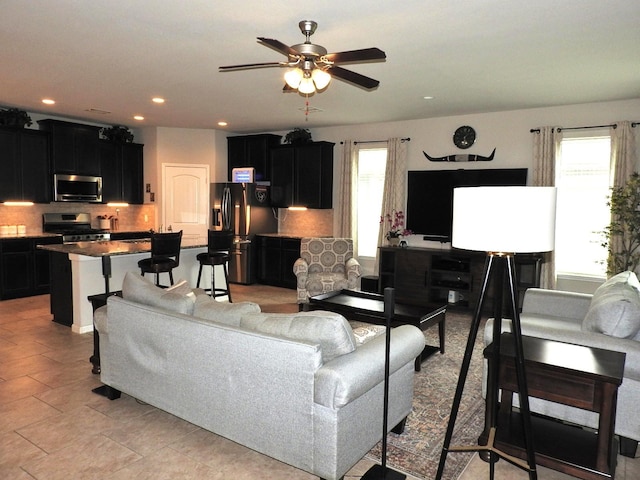 2705 Osprey Ln, Pearland, TX 77581 - living room featuring ceiling fan and recessed lighting