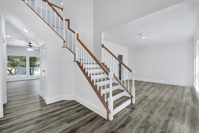 1826 Cheyenne River Cir, Sugar Land, TX 77478 - stairway with wood finished floors, baseboards, a textured ceiling, and a ceiling fan