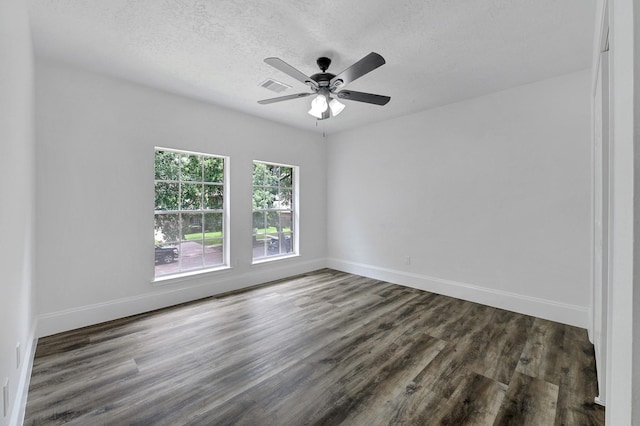 1826 Cheyenne River Cir, Sugar Land, TX 77478 - empty room featuring dark wood-style floors, ceiling fan, baseboards, and a textured ceiling