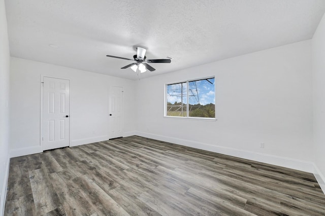 1826 Cheyenne River Cir, Sugar Land, TX 77478 - unfurnished bedroom with wood finished floors, baseboards, a ceiling fan, and a textured ceiling