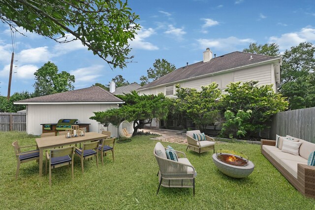 1826 Cheyenne River Cir, Sugar Land, TX 77478 - view of yard featuring an outdoor living space with a fire pit and outdoor dining area