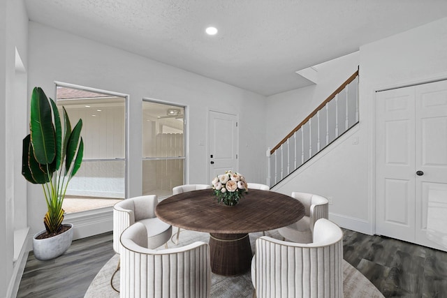 1826 Cheyenne River Cir, Sugar Land, TX 77478 - dining space featuring stairway, wood finished floors, baseboards, a textured ceiling, and recessed lighting