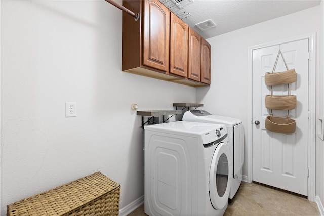 10711 Indian Trails Dr, Tomball, TX 77375 - laundry area featuring independent washer and dryer, cabinet space, and baseboards