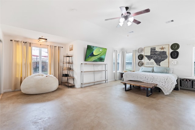 10711 Indian Trails Dr, Tomball, TX 77375 - bedroom featuring finished concrete floors, ceiling fan, and baseboards