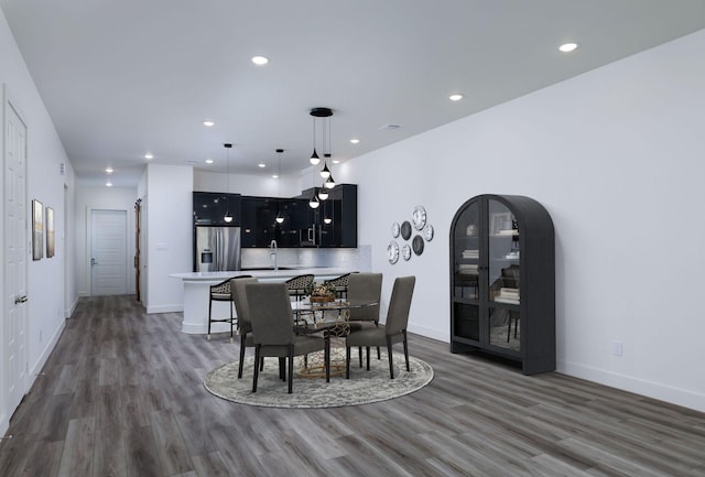 68 Fairway Dr, Trinity, TX 75862 - dining area with wood finished floors, recessed lighting, and baseboards