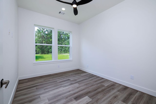 68 Fairway Dr, Trinity, TX 75862 - empty room with ceiling fan, wood finished floors, and baseboards