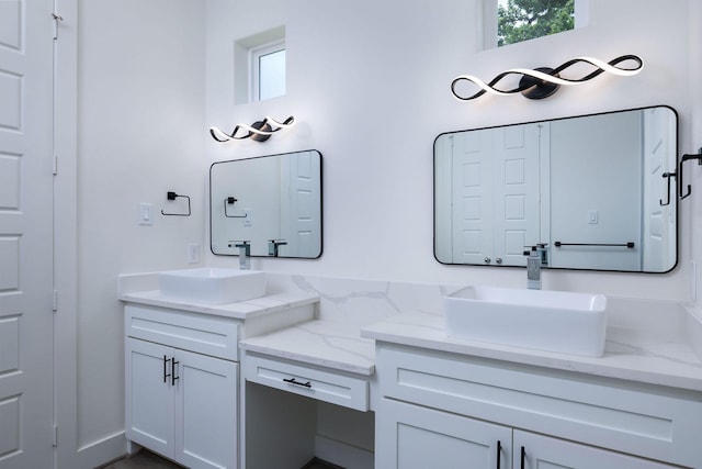 68 Fairway Dr, Trinity, TX 75862 - full bath with double vanity and healthy amount of natural light
