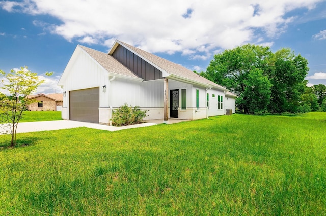 68 Fairway Dr, Trinity, TX 75862 - view of front of house with an attached garage, a front yard, driveway, and roof with shingles