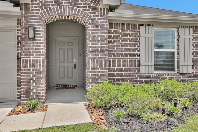 315 Coral Drift Ct, Crosby, TX 77532 - property entrance with brick siding and a garage