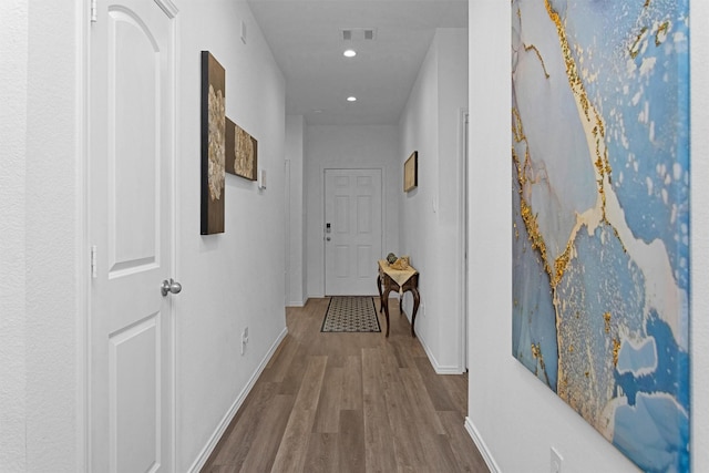 315 Coral Drift Ct, Crosby, TX 77532 - corridor with wood finished floors, baseboards, and recessed lighting