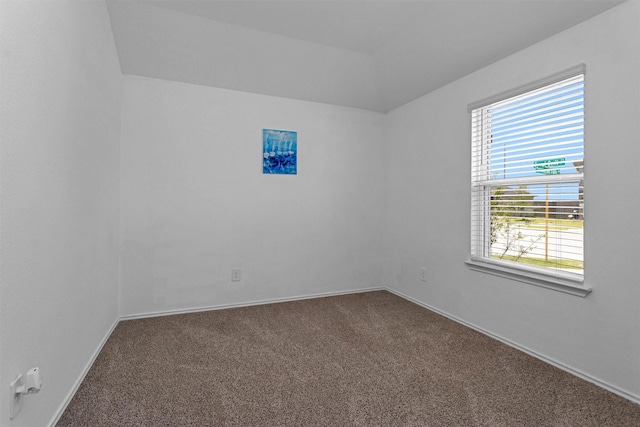 315 Coral Drift Ct, Crosby, TX 77532 - empty room featuring dark colored carpet and baseboards
