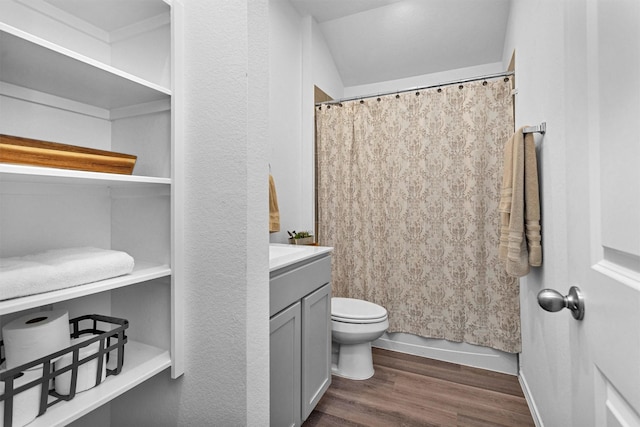 315 Coral Drift Ct, Crosby, TX 77532 - bathroom featuring toilet, wood finished floors, vanity, and baseboards