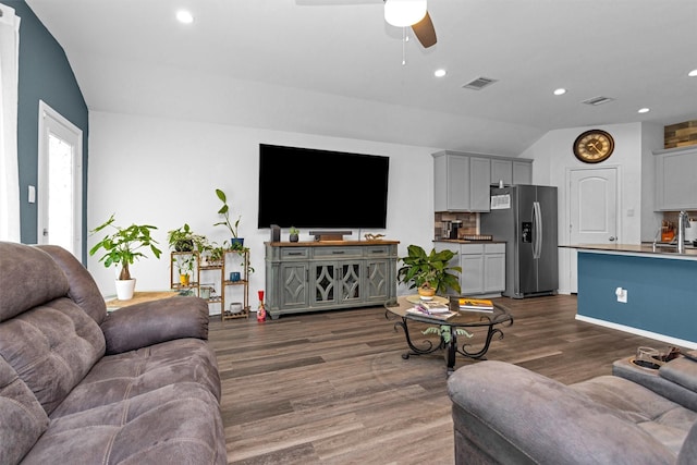 315 Coral Drift Ct, Crosby, TX 77532 - living area with ceiling fan, vaulted ceiling, dark wood finished floors, and recessed lighting