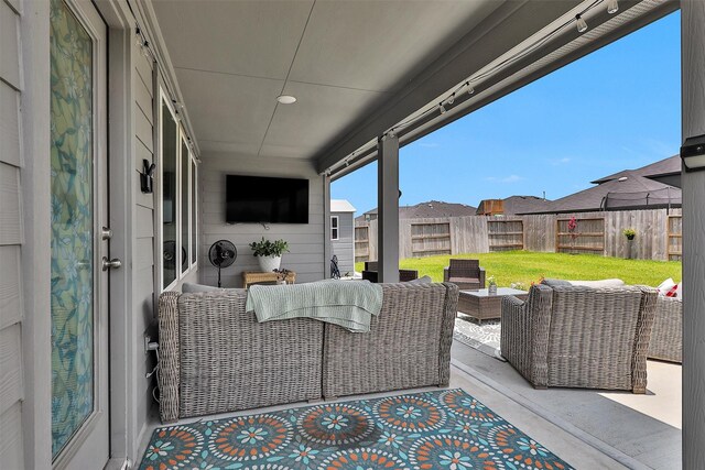 315 Coral Drift Ct, Crosby, TX 77532 - view of patio featuring an outdoor living space