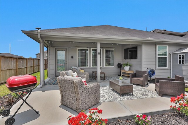 315 Coral Drift Ct, Crosby, TX 77532 - view of patio featuring outdoor lounge area and grilling area