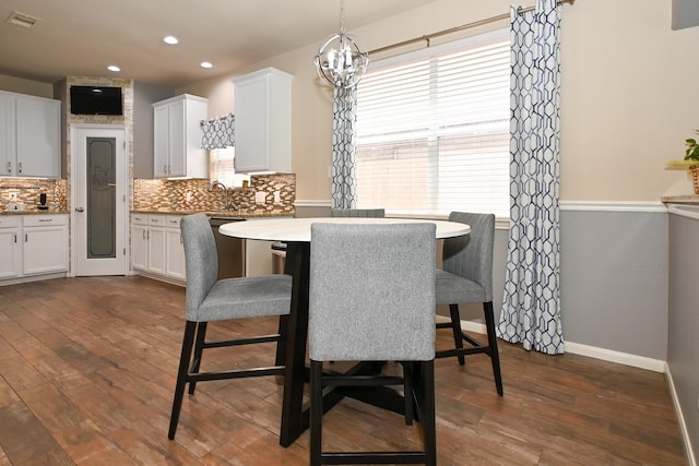 26414 Longview Creek Dr, Katy, TX 77494 - dining area with dark wood-style floors, a chandelier, baseboards, and recessed lighting