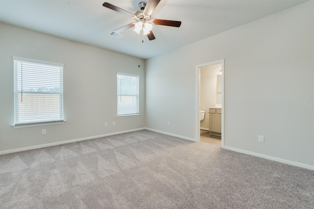 27398 Axis Deer Trl, Magnolia, TX 77354 - empty room with light carpet, ceiling fan, and baseboards