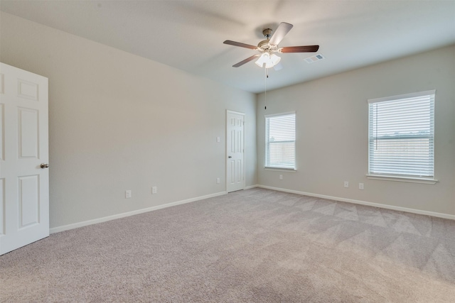 27398 Axis Deer Trl, Magnolia, TX 77354 - unfurnished room featuring ceiling fan, light carpet, and baseboards