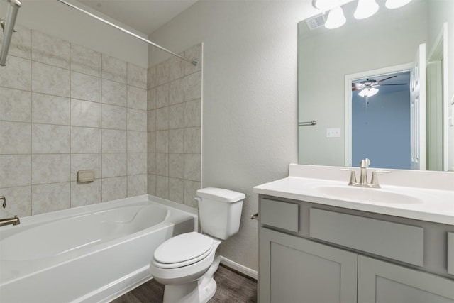 27398 Axis Deer Trl, Magnolia, TX 77354 - full bath with wood finished floors, toilet, vanity, shower / bathtub combination, and ceiling fan